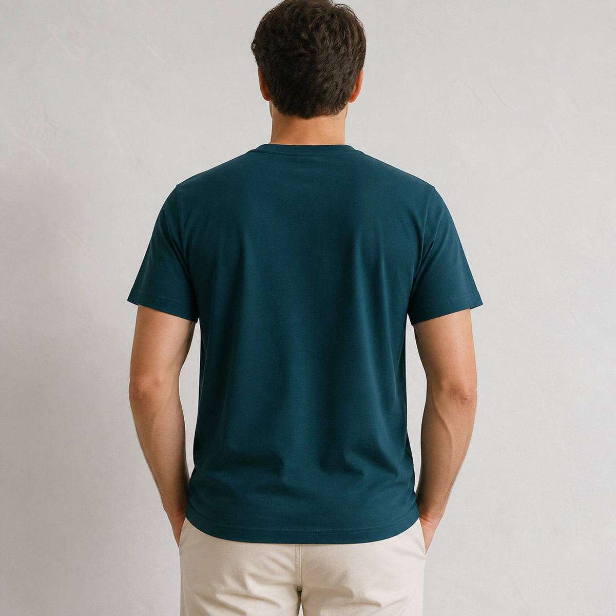 AC/DC Red Outline Logo Tee — Teal — worn on model, back