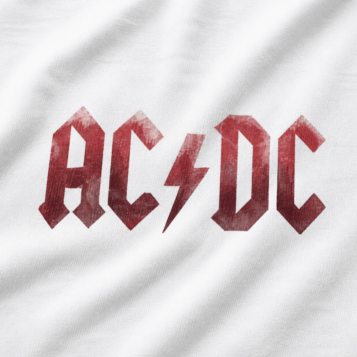 AC/DC Faded Red Logo Tee — White — print detail close-up