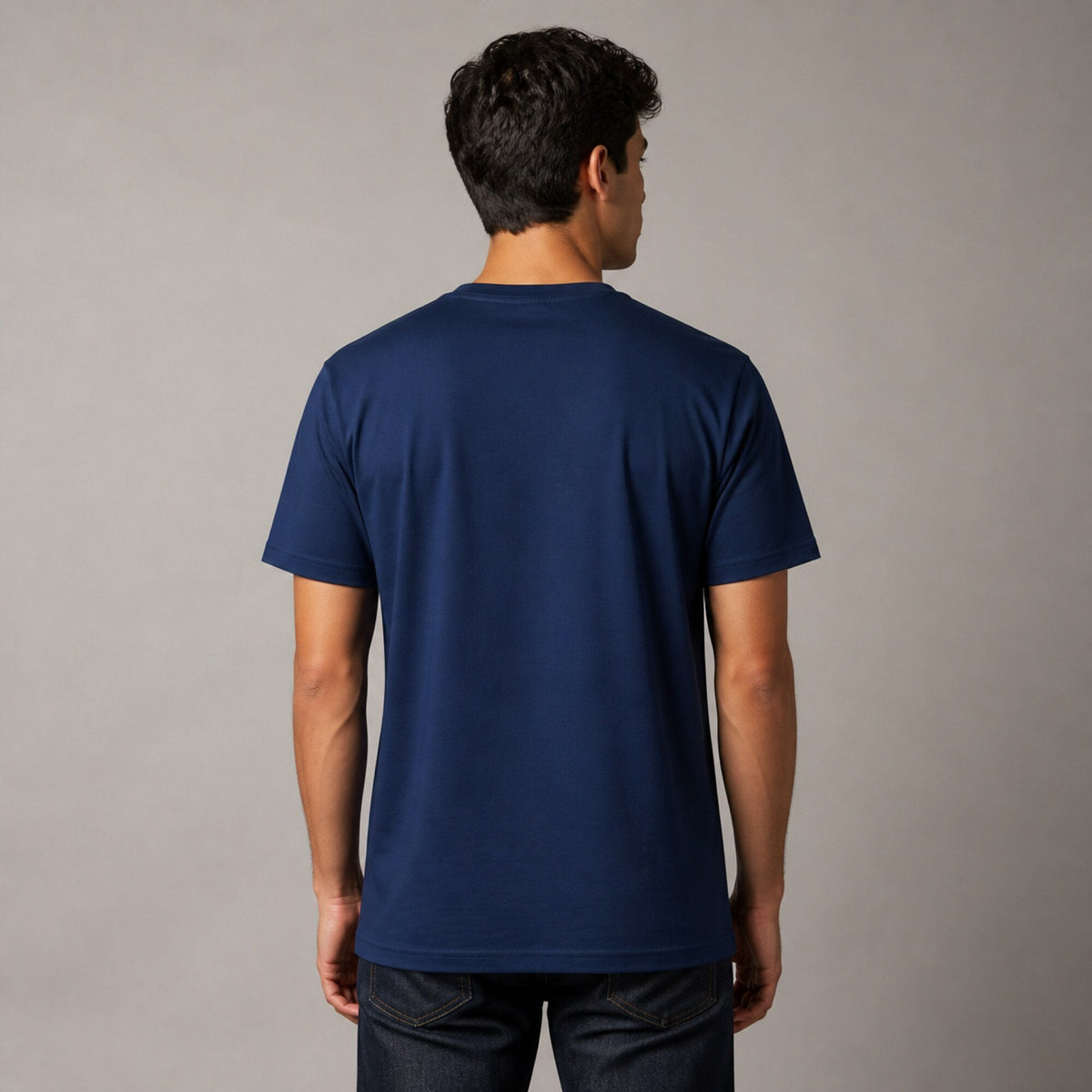 Adventure Begins Here Unisex T-Shirt — worn on model, back