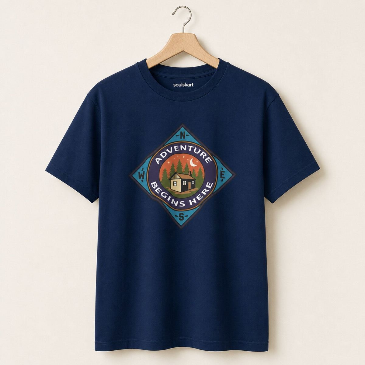 Adventure Begins Here Unisex T-Shirt — on hanger