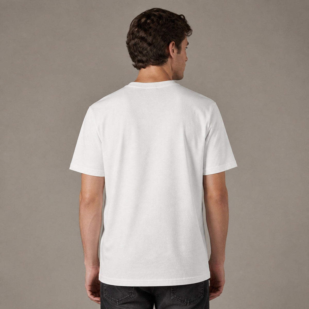 Adventure Begins Unisex T-Shirt — worn on model, back