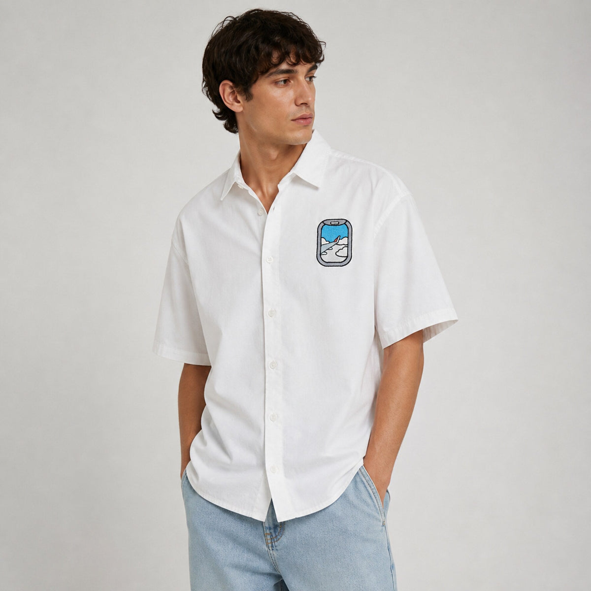 Airplane Into The Clouds Embroidery Oversized Shirt — worn on model, front