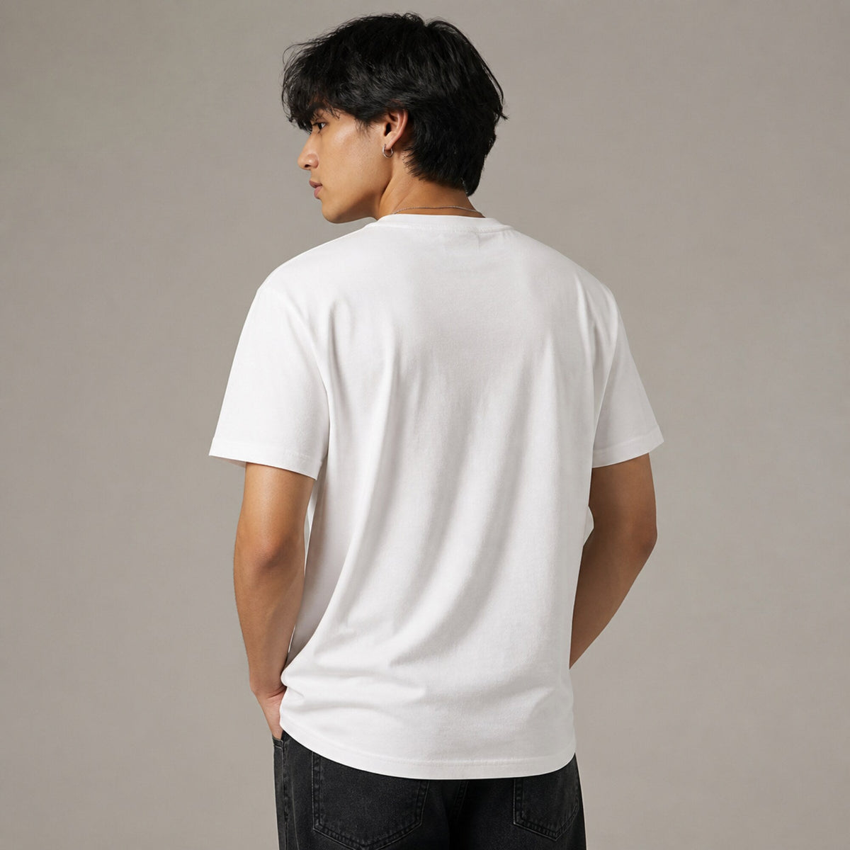 Arctic Monkeys Retro Wordmark Tee — worn on model, back