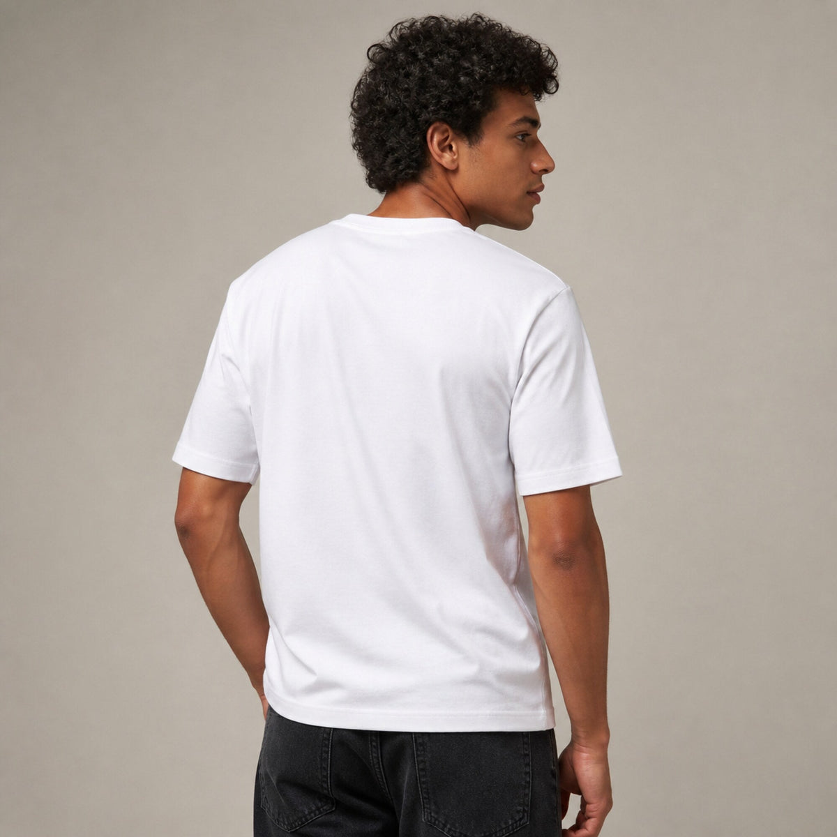 Arctic Monkeys Block Wordmark Tee — worn on model, back