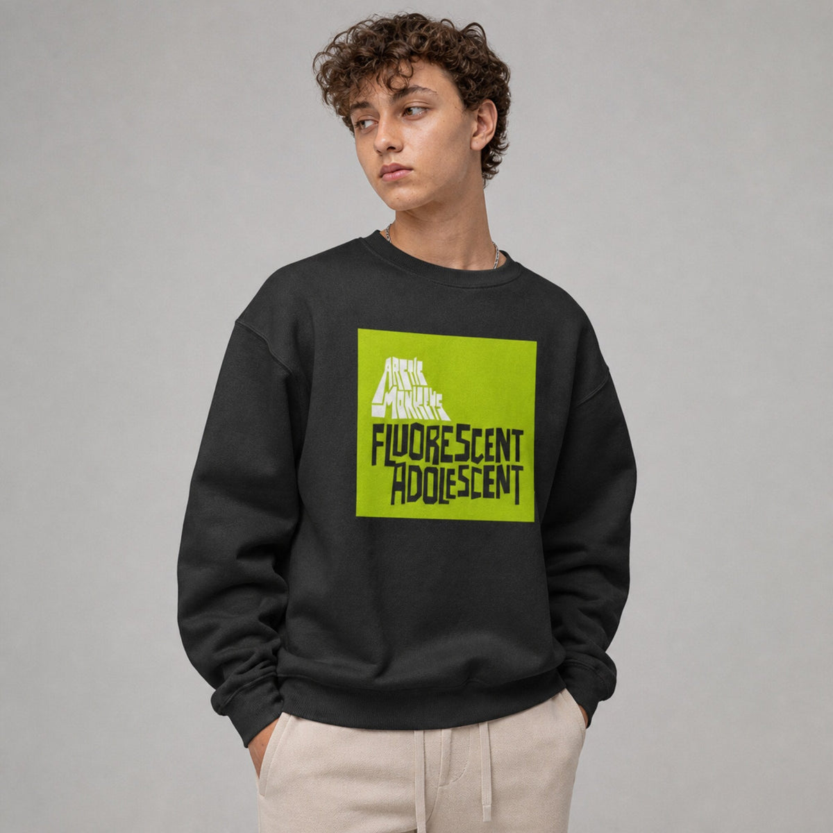 Arctic Monkeys Unisex Premium Sweatshirt — worn on model, front