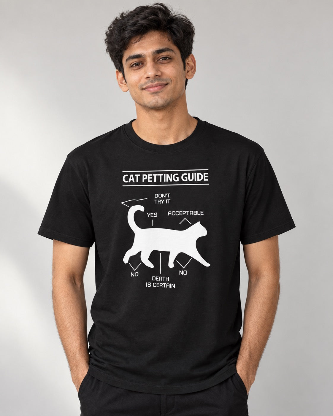Cat Petting Guide black diagram tee on male model, front