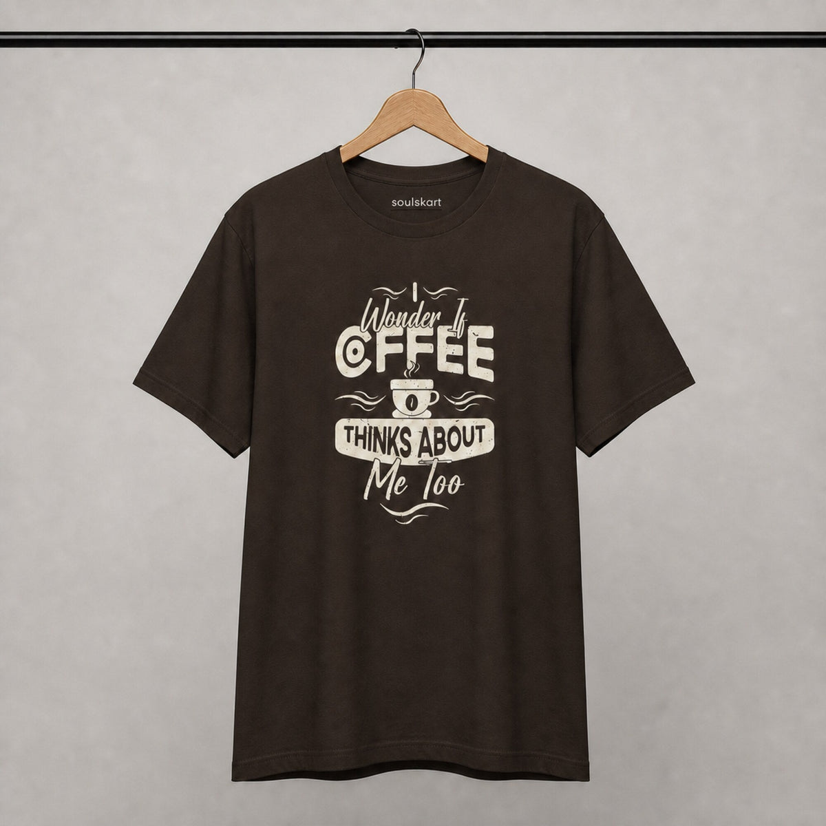 I Wonder If Coffee Thinks About Me Too Unisex T-Shirt — on hanger
