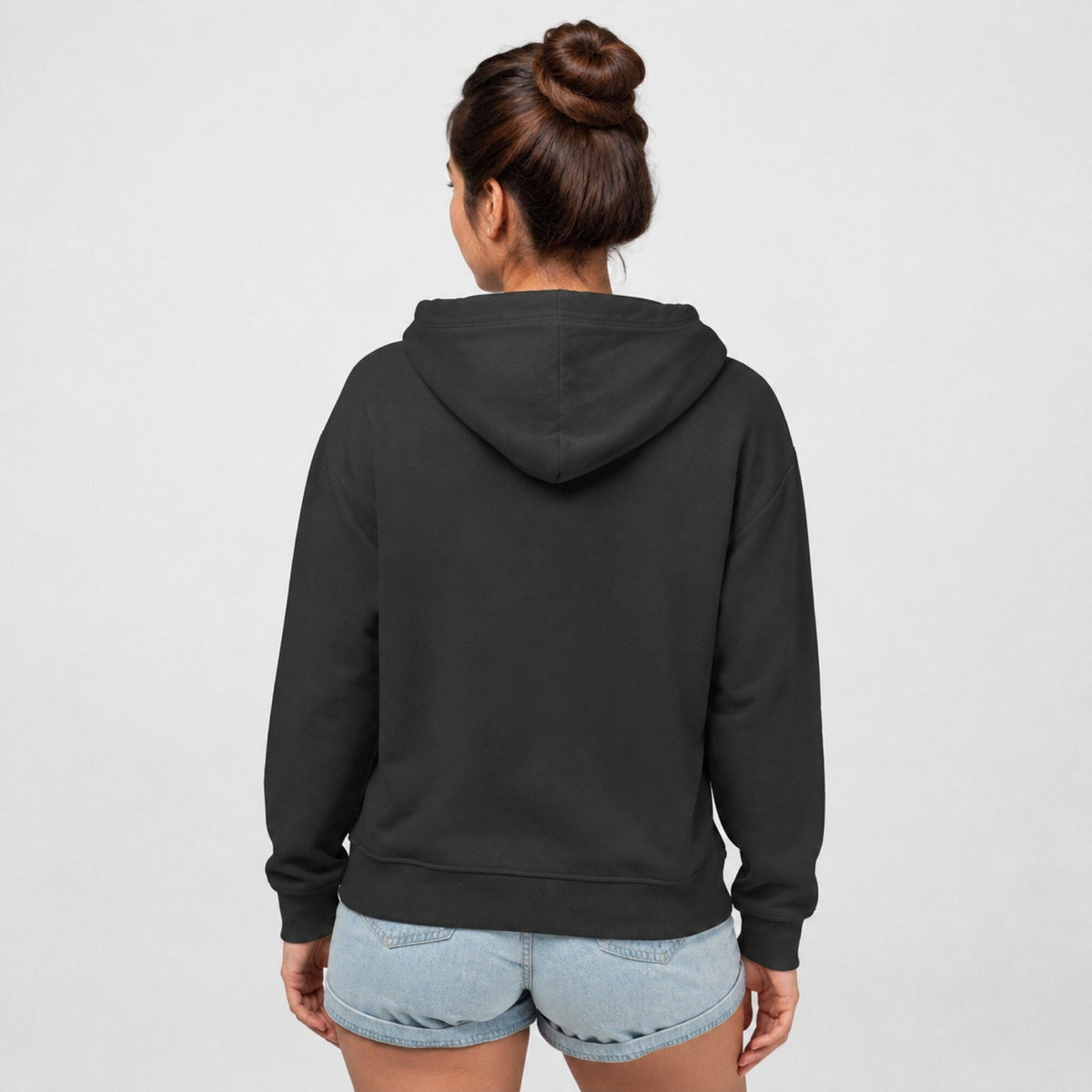 Janis Joplin Unisex Black Hoodie — worn on model, back