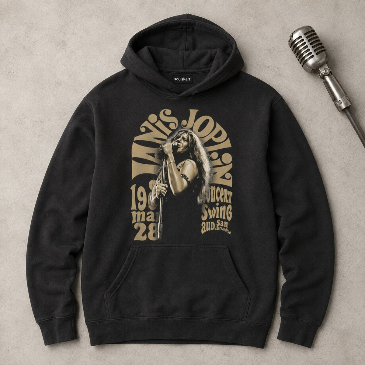 Janis Joplin Unisex Black Hoodie — on hanger