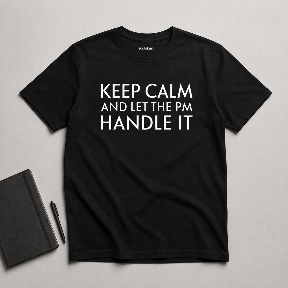 Keep Calm and Let the PM Handle It Tee — on hanger