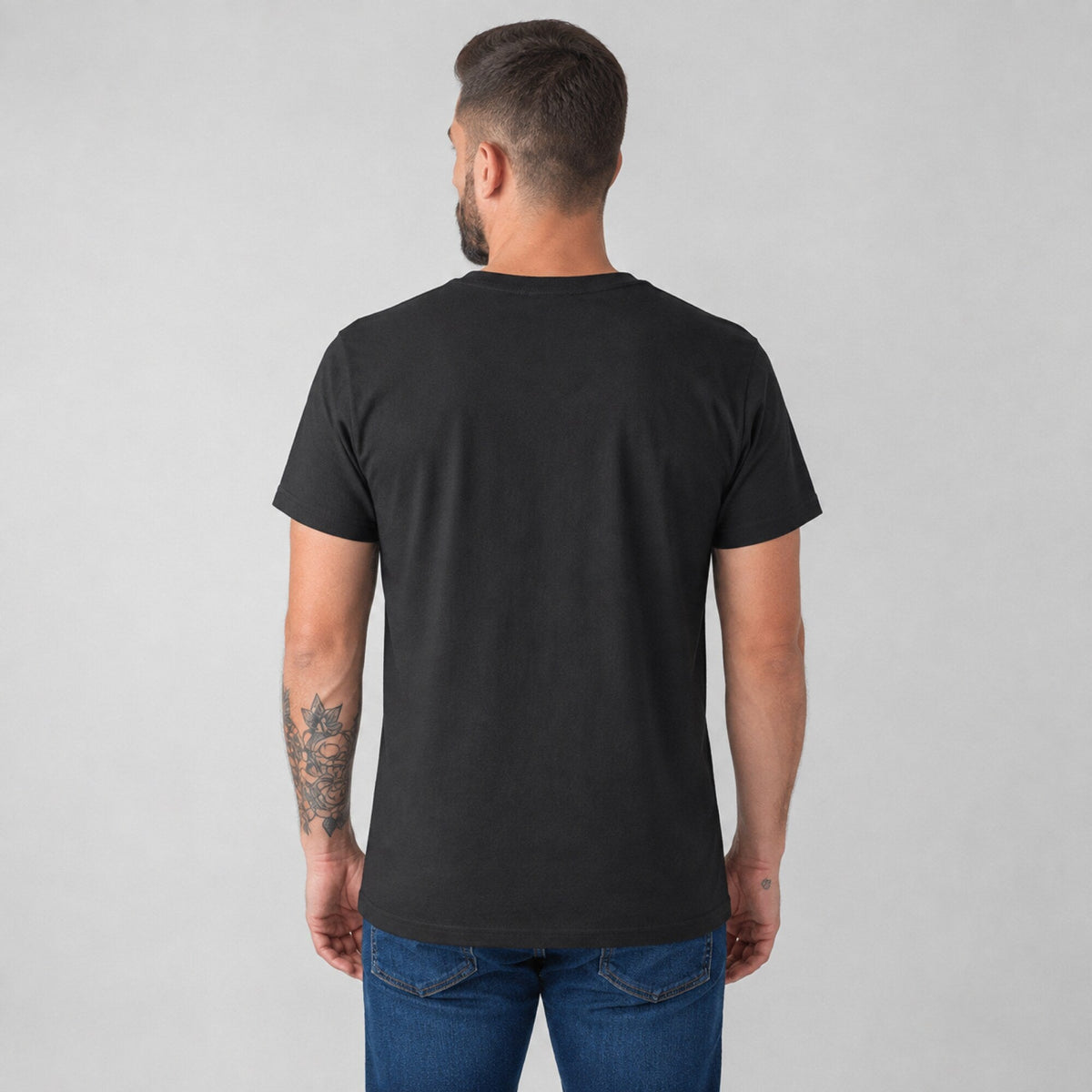 KISS Logo Wordmark Tee — worn on model, back