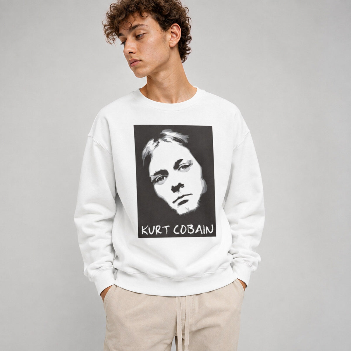 Kurt Cobain- Nirvana Unisex Premium Sweatshirt — worn on model, front