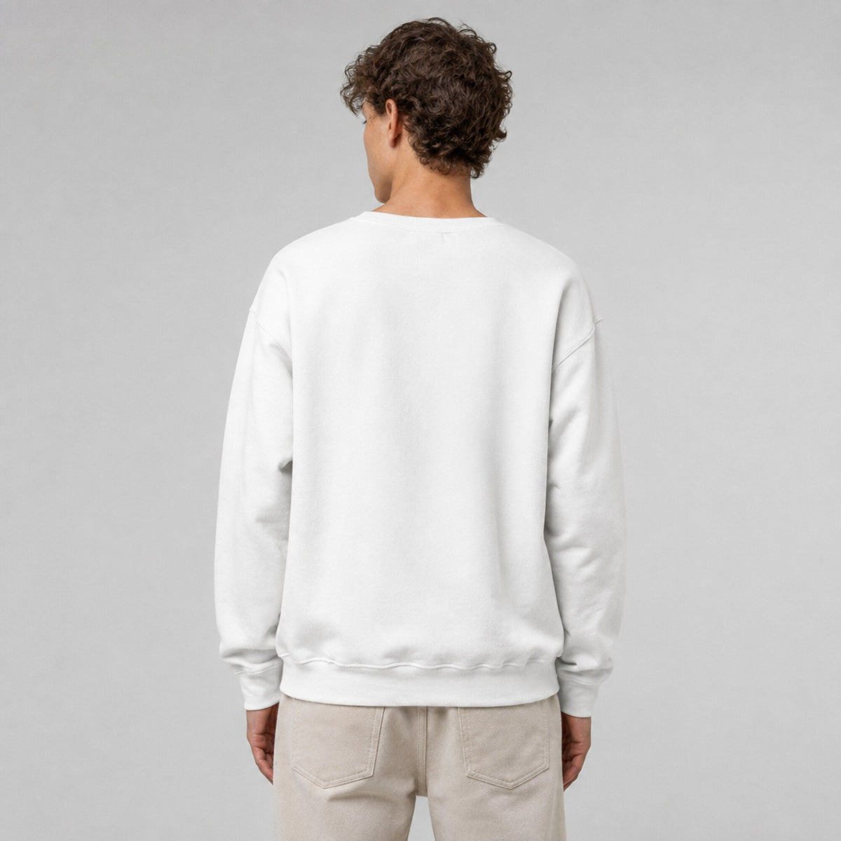 Kurt Cobain- Nirvana Unisex Premium Sweatshirt — worn on model, back