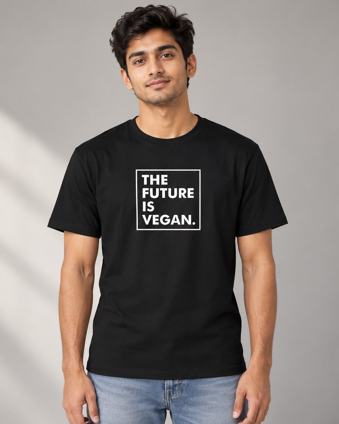 The Future Is Vegan black graphic tee on male model, front