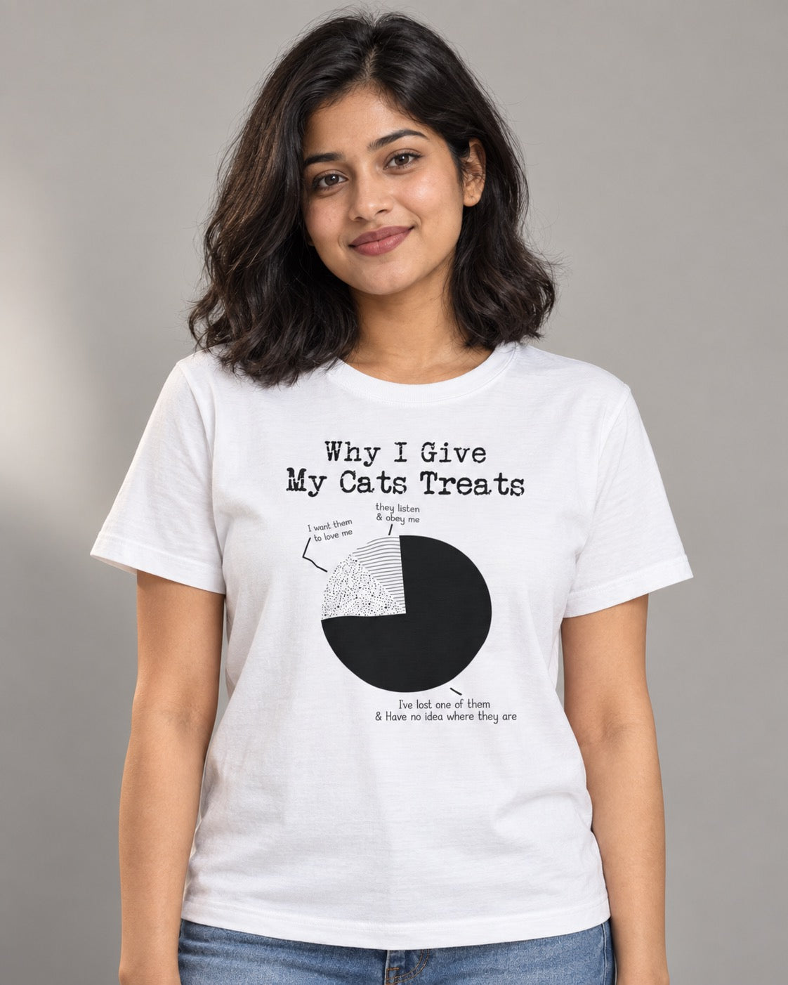Why I Give My Cats Treats white graphic tee on female model, front