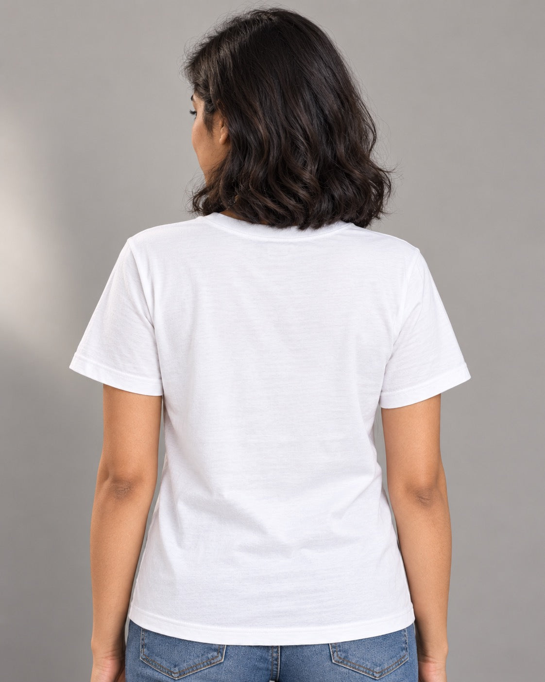 Why I Give My Cats Treats white tee on female model, plain back