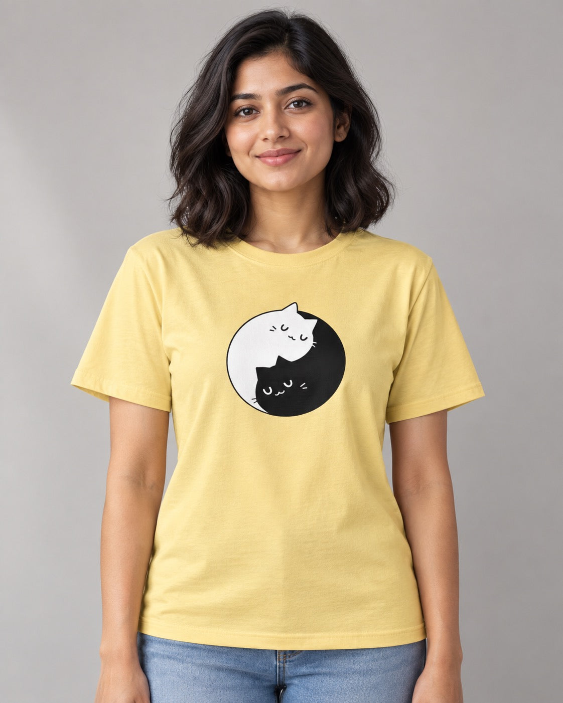 Yin Yang Cats yellow graphic tee on female model, front